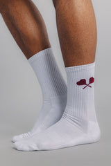 Side view of male tennis sock featuring heart racquet logo on the side, made from soft organic cotton blend.